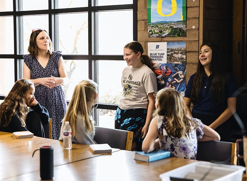 girls talking in classroom